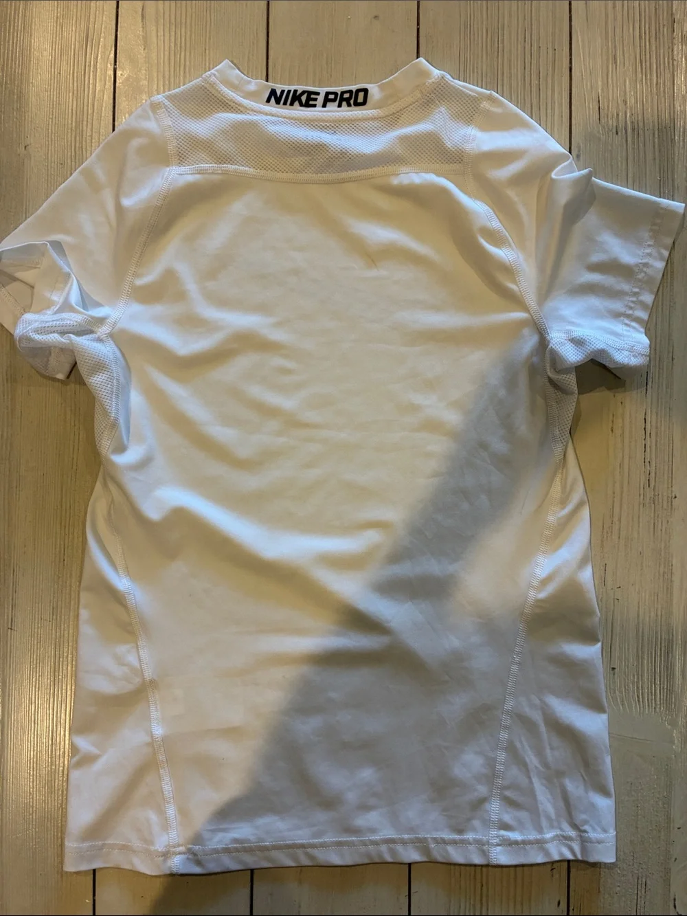 Nike White Short-Sleeve Dri-FIT Training Tee with Black Swoosh